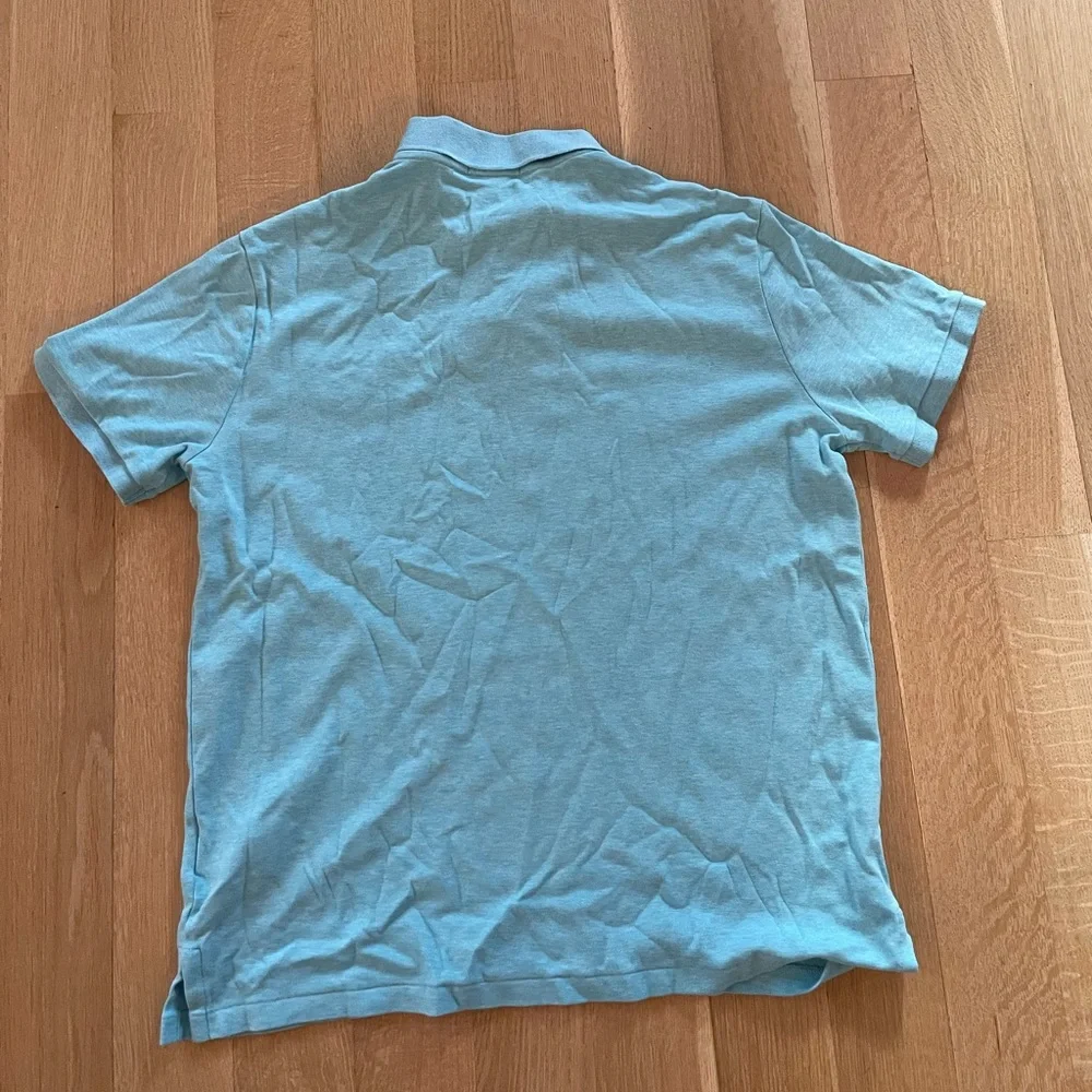 Ralph Lauren Light Blue Polo Shirt with Multi Color Pony Logo